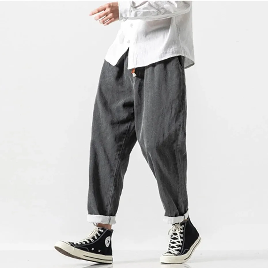 CLASSIC TAPERED DENIM PANTS